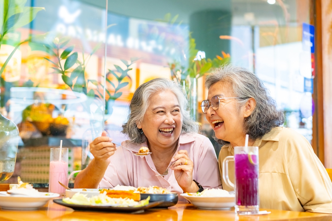 Elderly couple discussing estate plans
